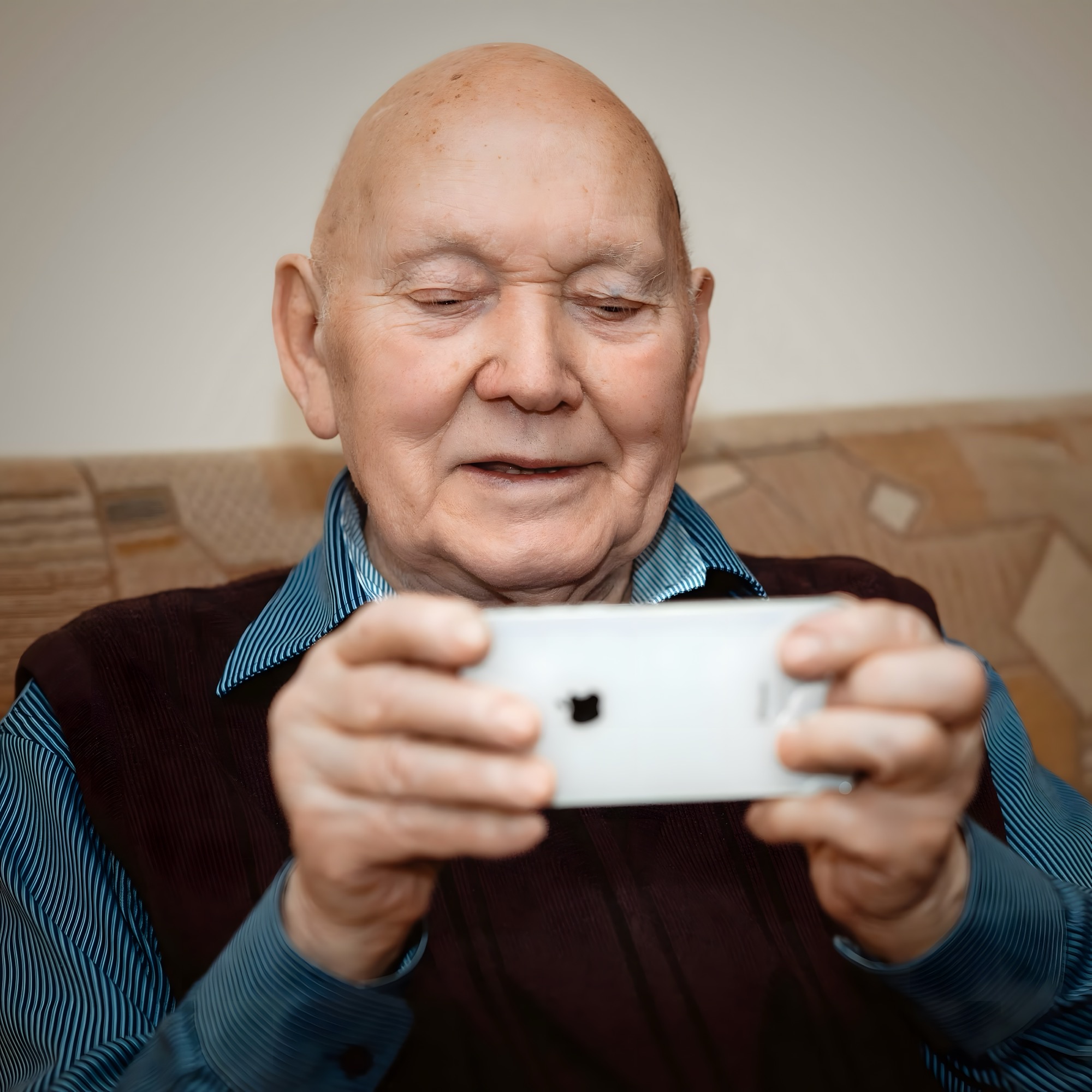 Volunteers helping Internet Club members with their devices at a community session